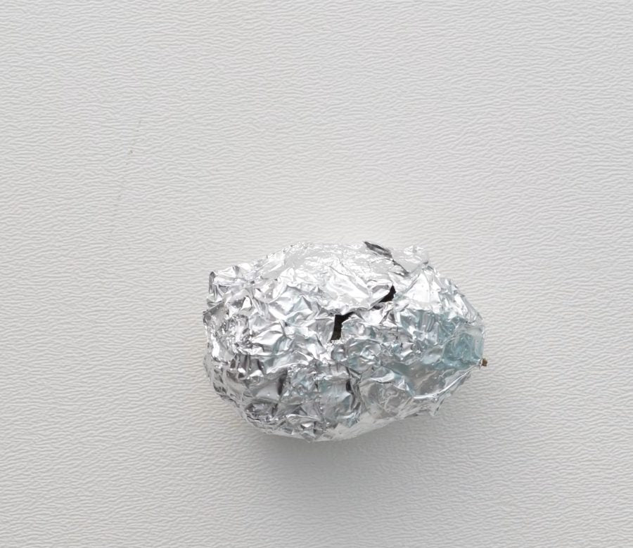 A foil-wrapped OBDK owl pellet